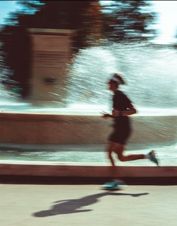 Runner in a city