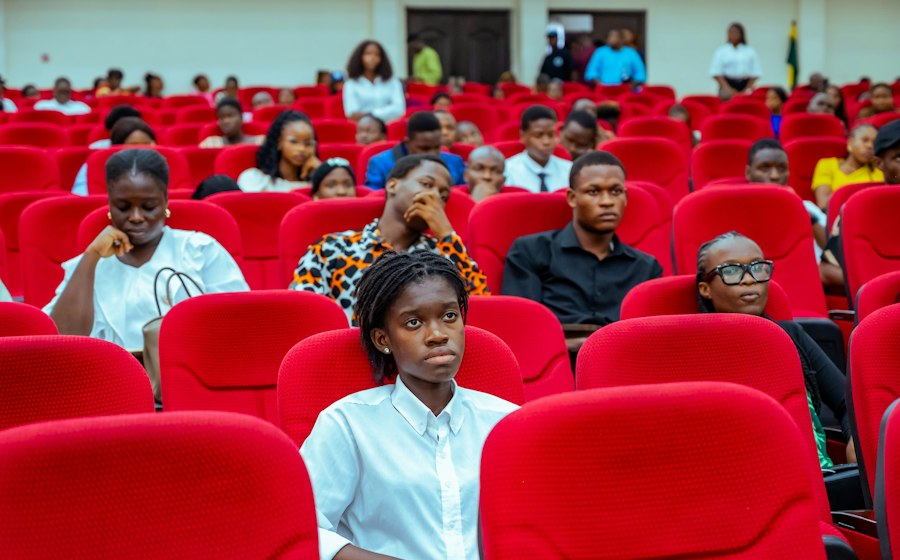 Students in a college auditorium